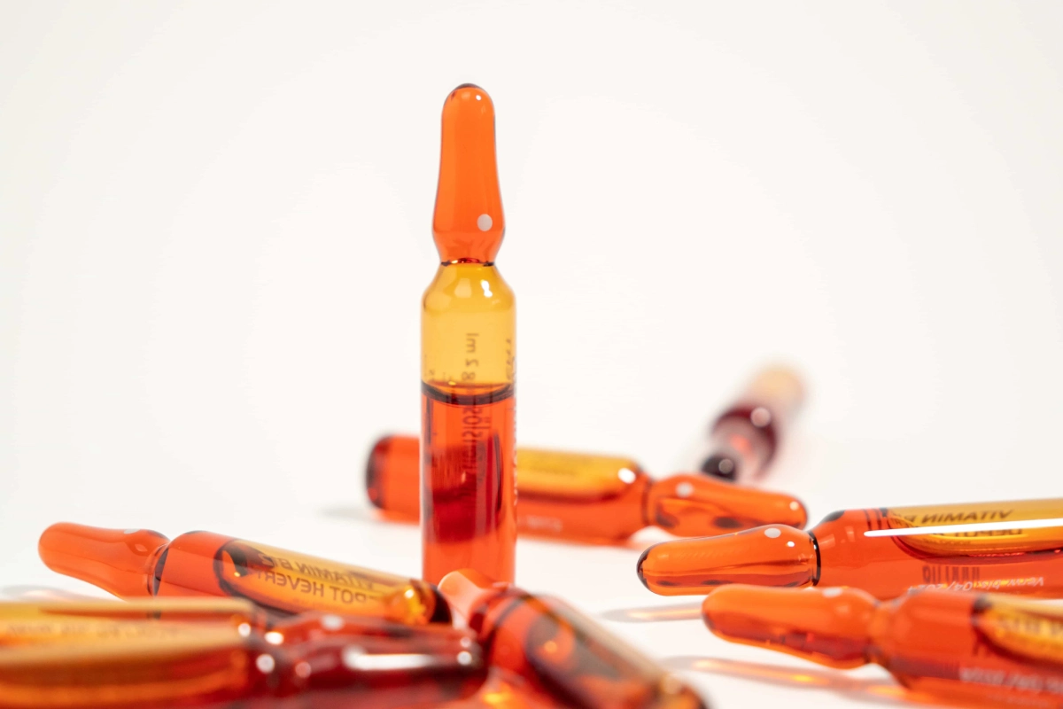 Close-up of vitamin B12 injection vials in Katy, TX for energy levels and address nutrient deficiencies