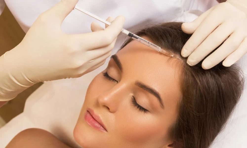 Woman receiving hair restoration treatment in Katy, TX